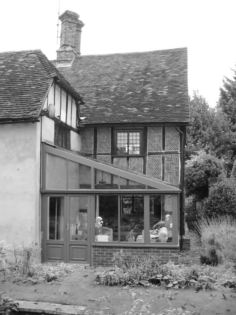 major reconfiguring of listed building garden room before