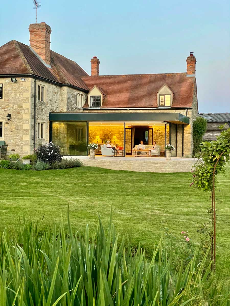 Glass and green roof extension to listed building